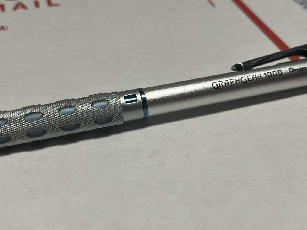 Graphgear 1000 Mechanical Pencil with a blue anodized titanium body