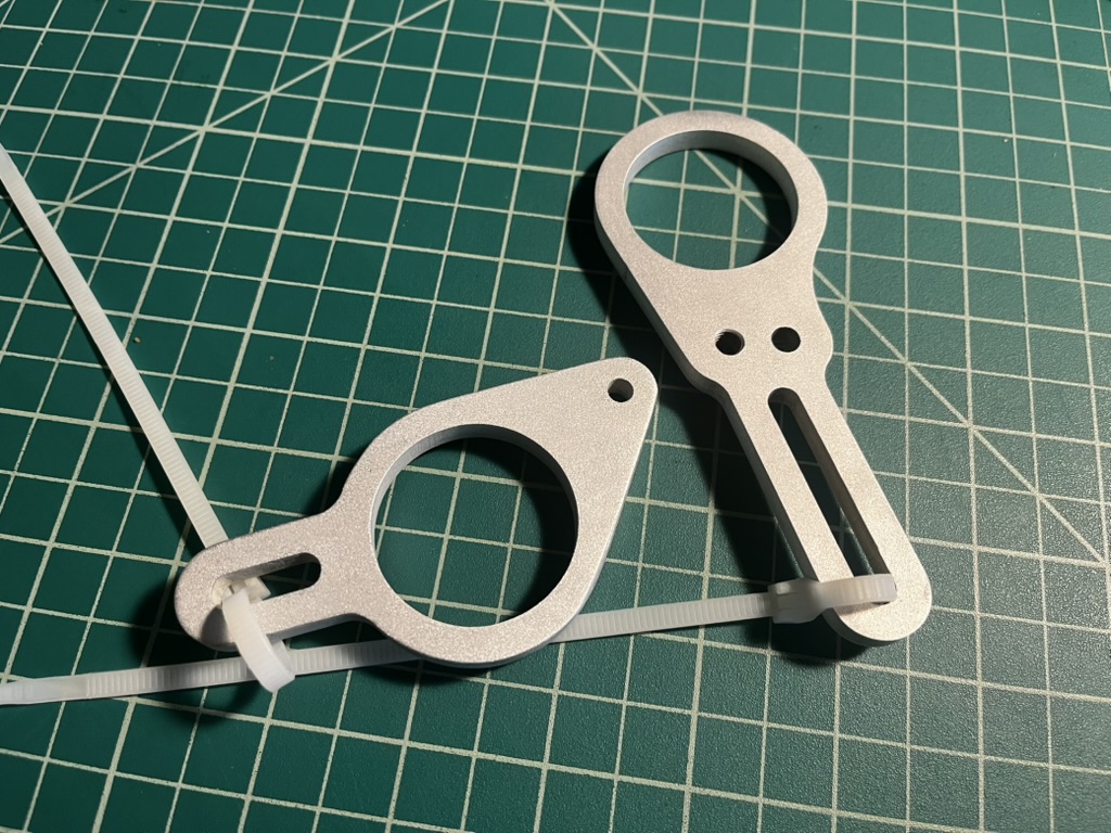 Two flat, etched aluminum parts for a SME shop tool project